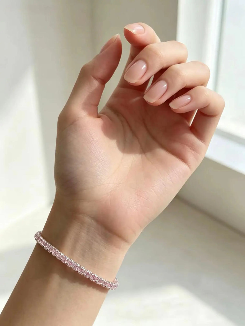 Pulsera tennis circones rosados plata vista lateral