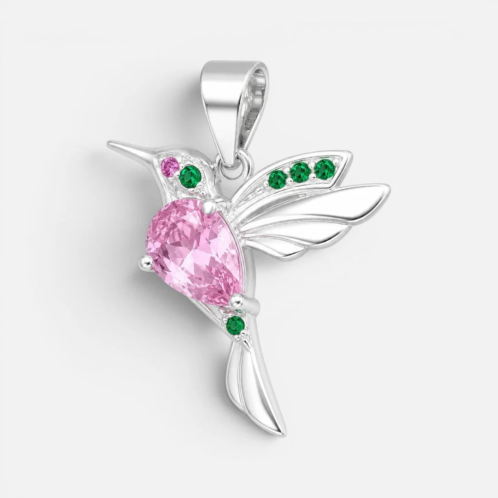 Colgante colibrí plata 925 con zirconia rosada y esmeraldas detalle